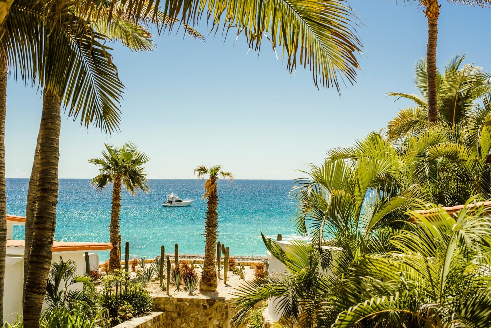 Los Cabos coastline with luxury resort terraces overlooking the ocean